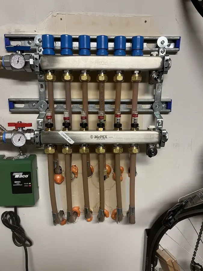 Plumber performing Water Heater Repair at a residential property in Milo